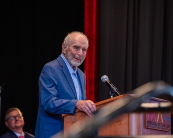 Dr. Infantino speaks from the podium.