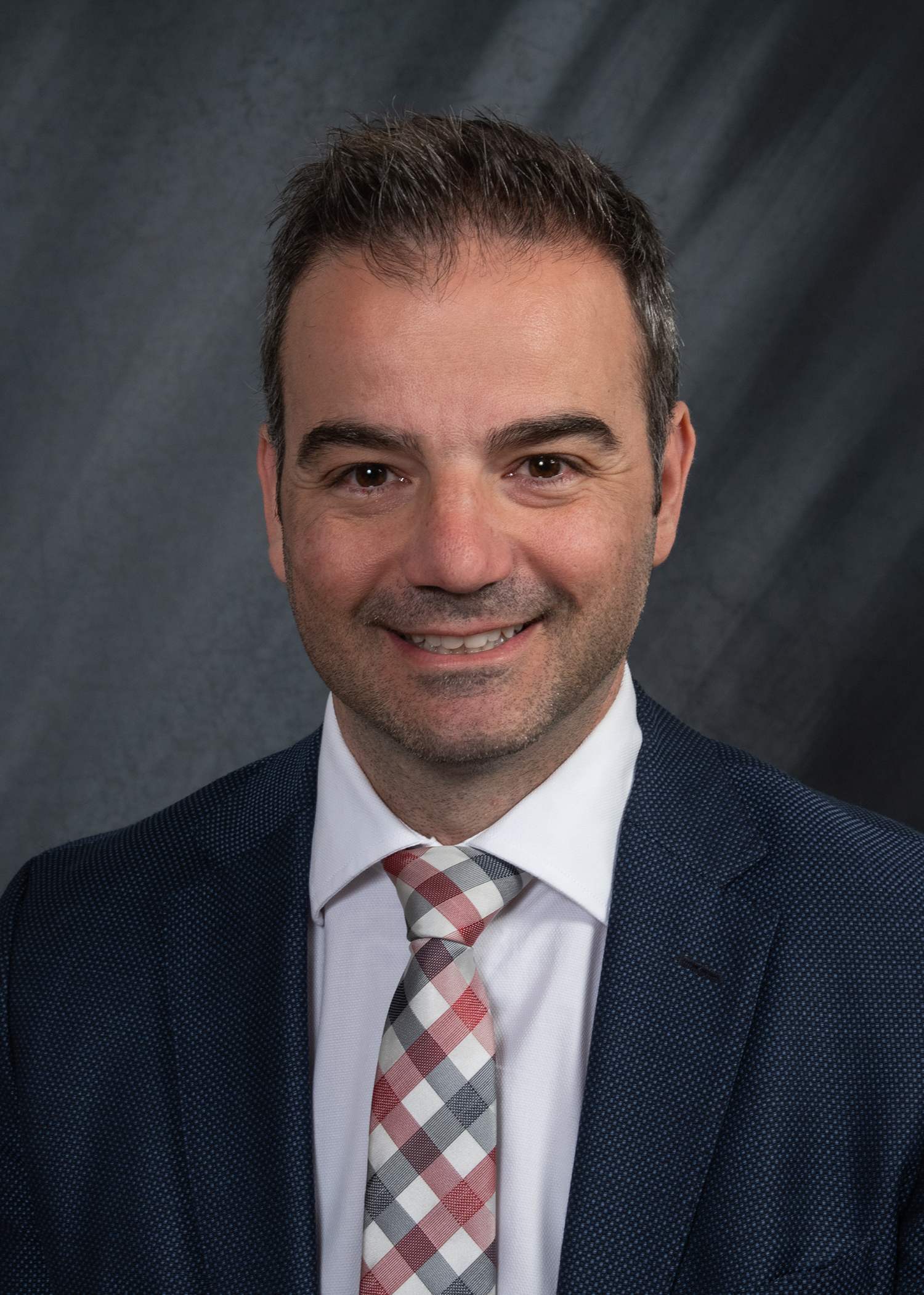 a portrait of Dr. Konstantinos Chochlidakis.