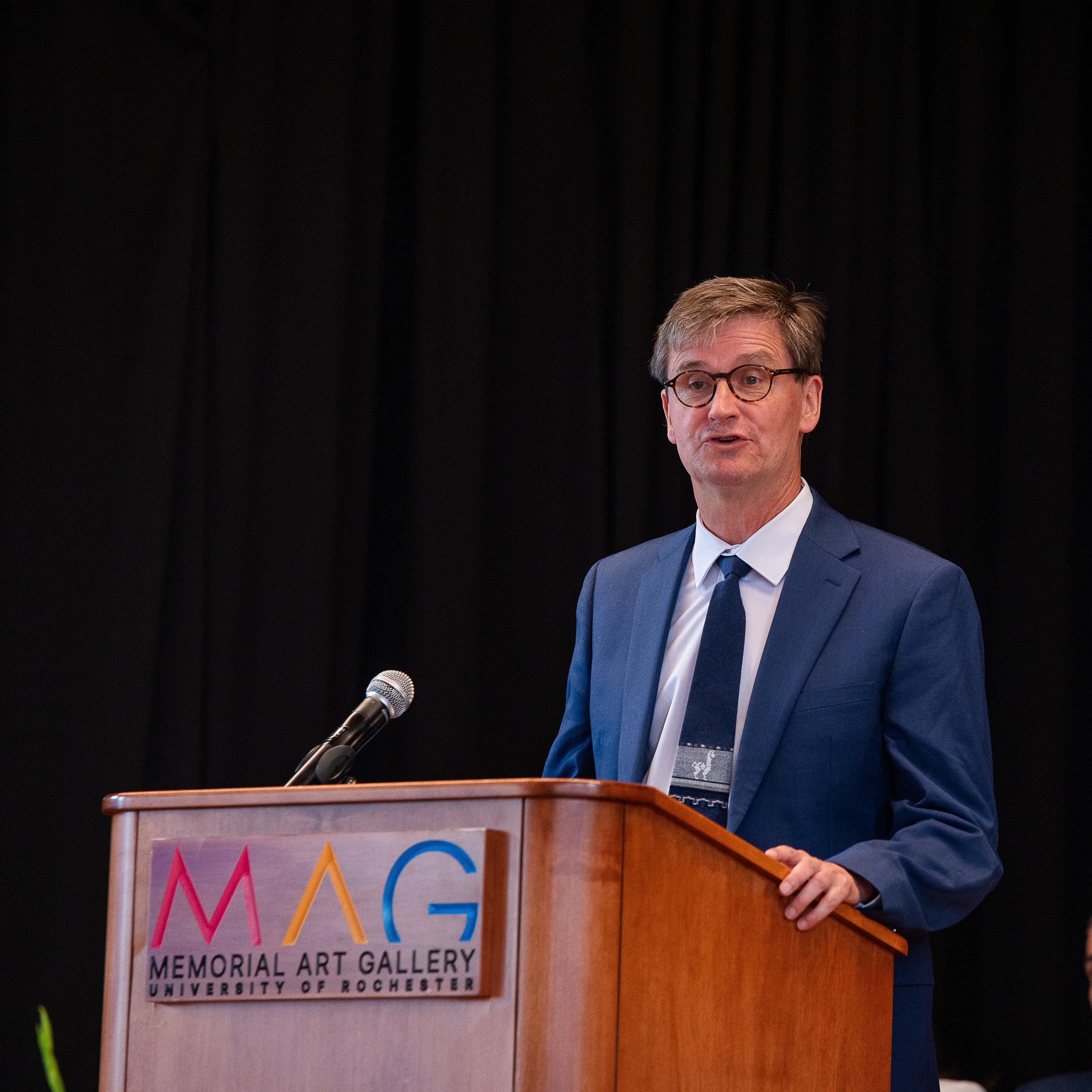 Dr. Malmstrom speaks from the podium.