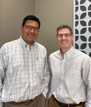 portrait of Wilmot Cancer Institute scientists Darren Carpizo and Scott Gerber 