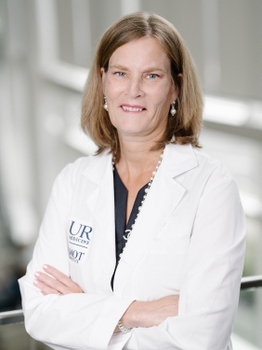 Susan Dent MD portrait in white coat