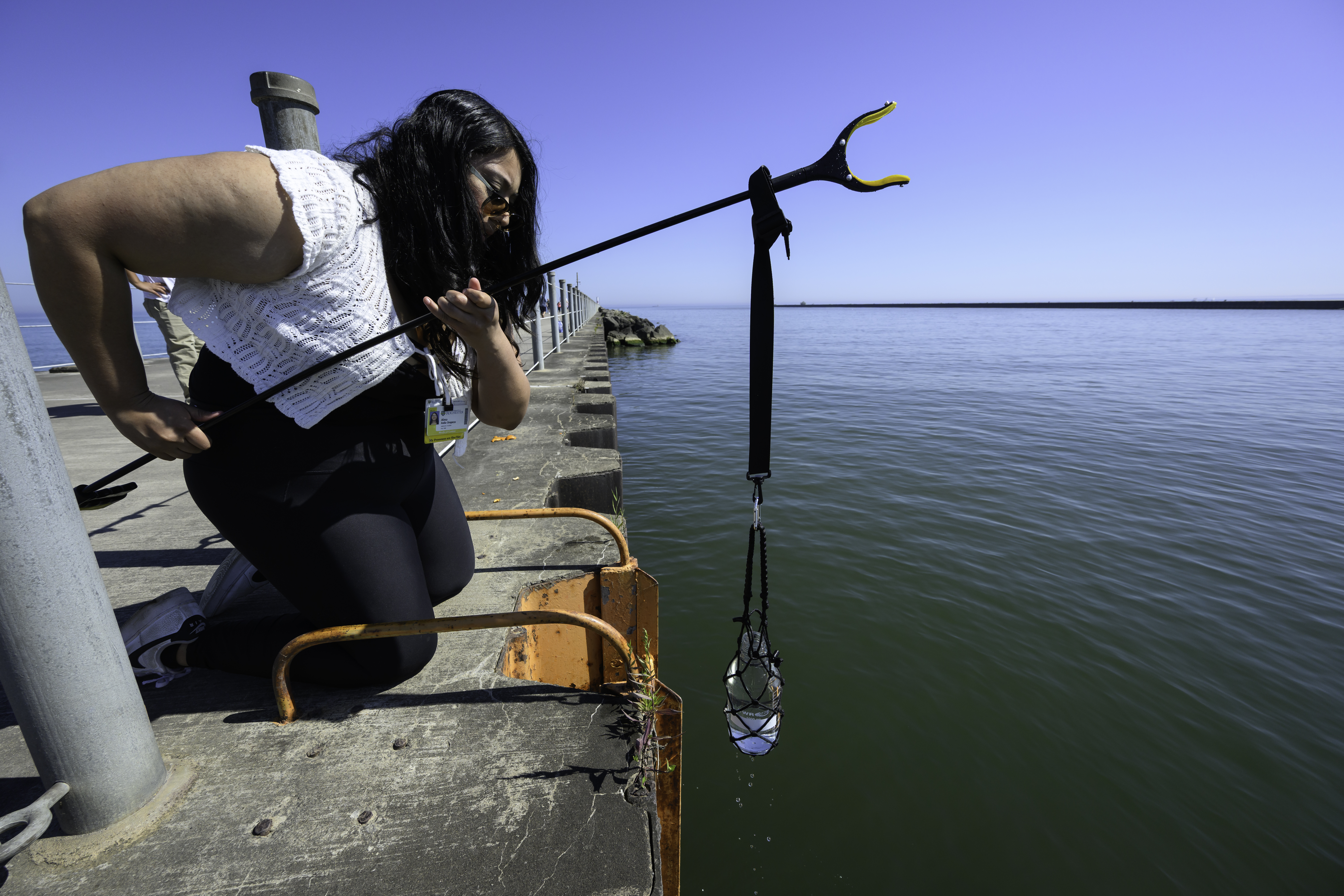 Researcher pulling water out of lake