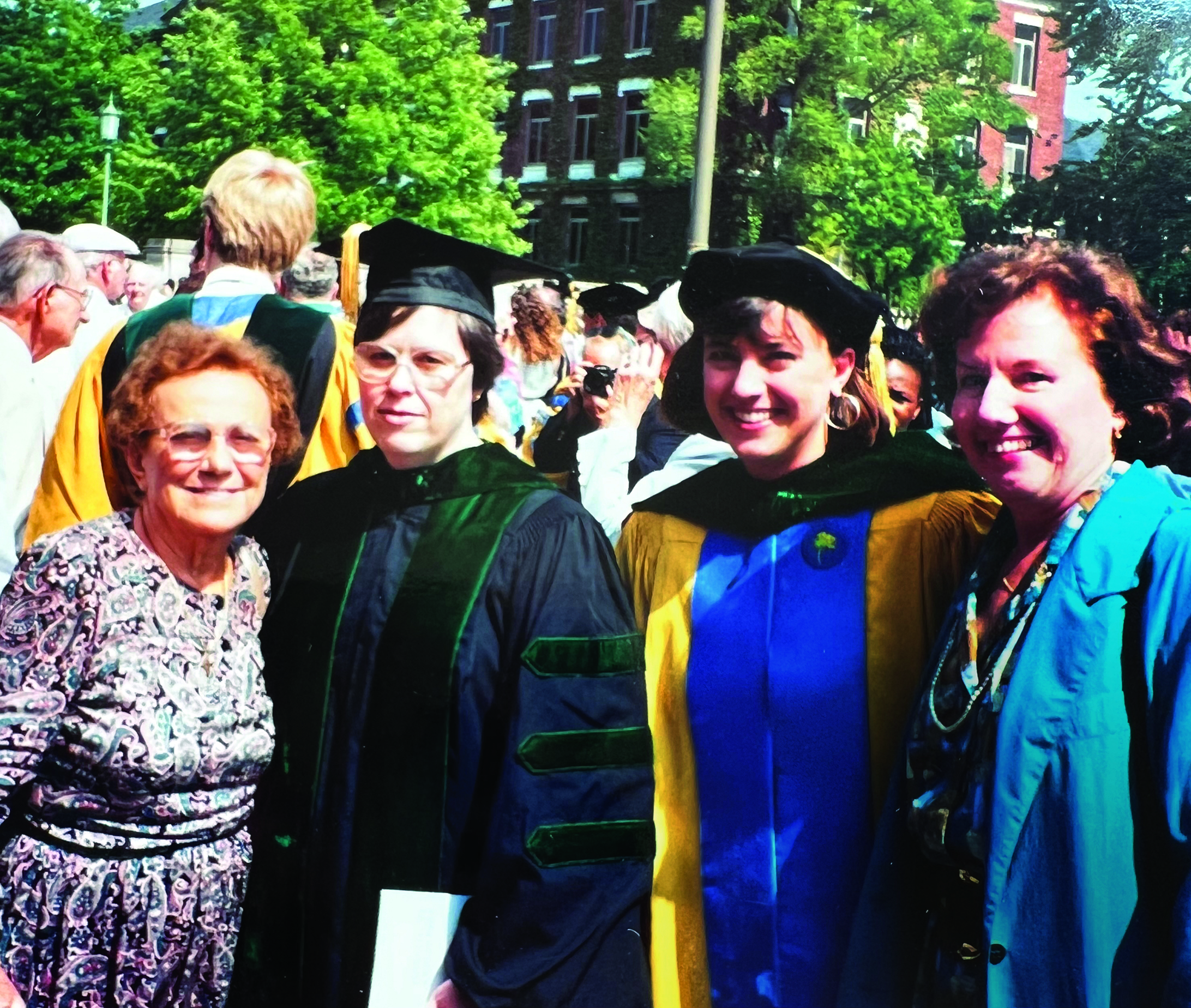 Helen’s YiaYia (grandmother) Demetra; mentor Mary Lou Myers, MD; Helen; and Joyce at Helen’s SMD graduation in 1992. 