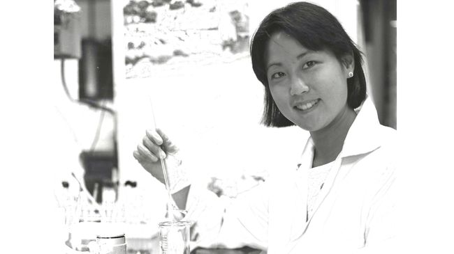 Carol Mimura as post doc at Berkeley doing an experiment in the lab.