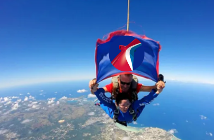 As part of the celebration of the first-ever Special Forces Legacy Initiatives (SFLI) cruise on Carnival Paradise, Duffy accepted the challenge to tandem skydive on Oct. 19. (Image at LateCruiseNews.com - October 2024