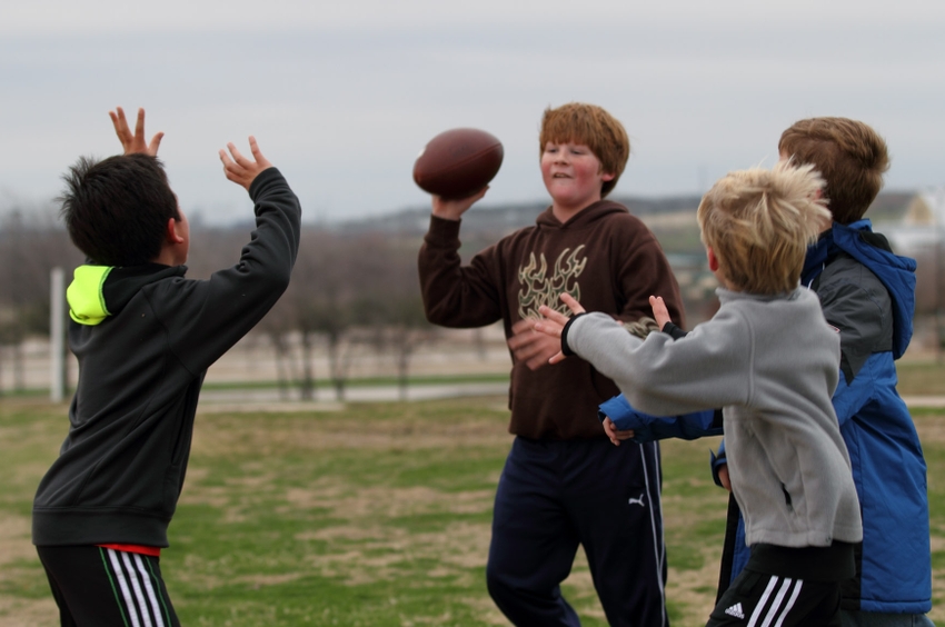 Photo Football game with boys American Heart Association