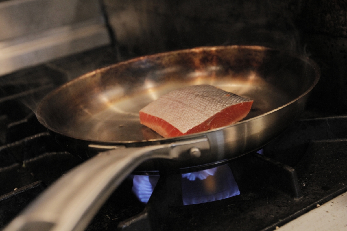 Photo Salmon cooking in skillet American Heart Association