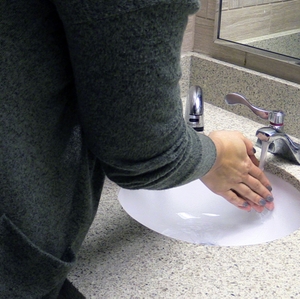 Woman washing hands