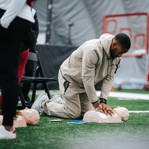 NFL Carolina Panthers players, PSL Owners and Tepper Sports & Entertainment staff complete CPR training
