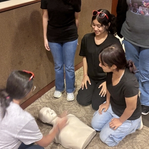 students practicing Hands-Only CPR