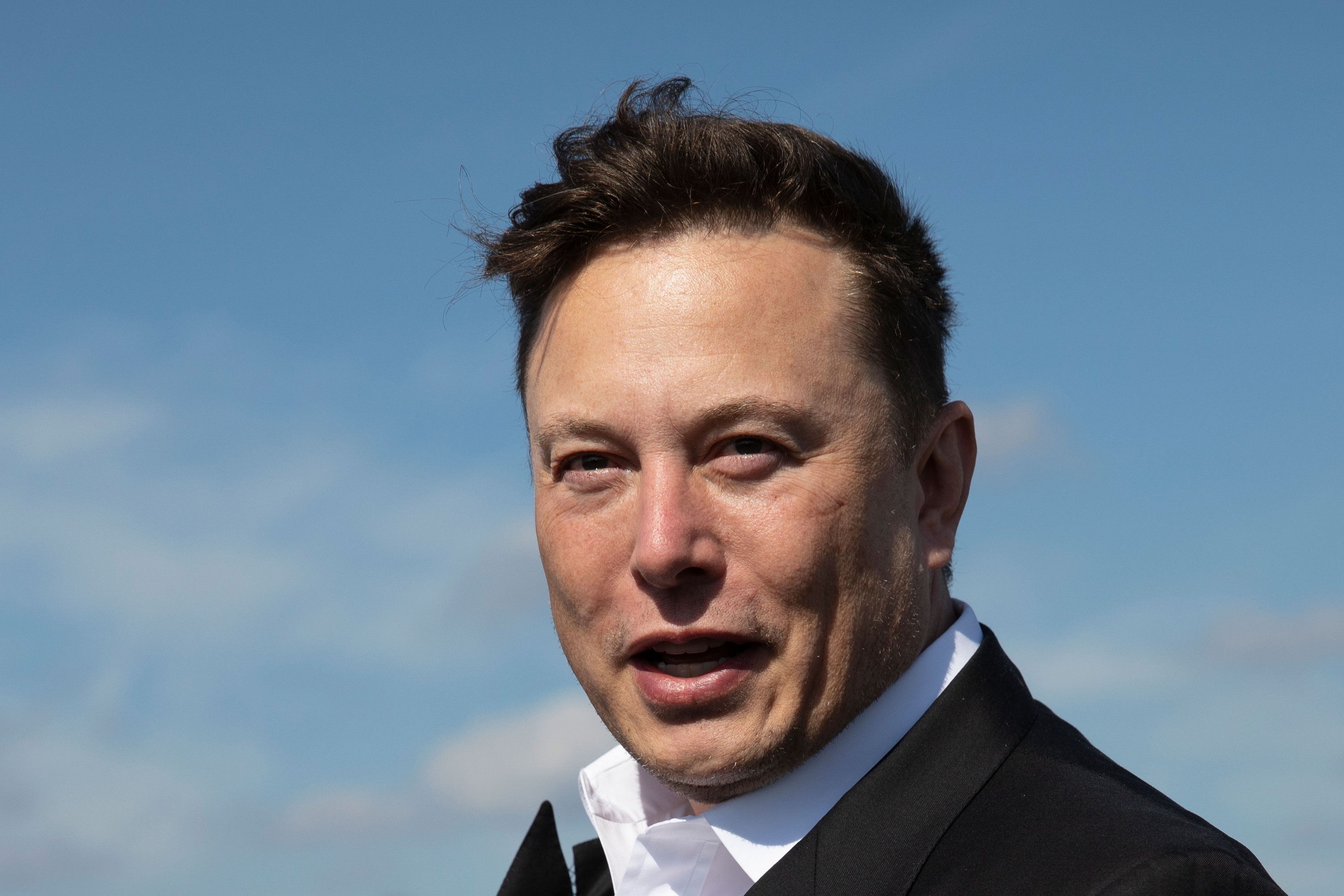 Elon Musk warns employees Tesla's stock could 'get crushed like a soufflé under a sledgehammer'