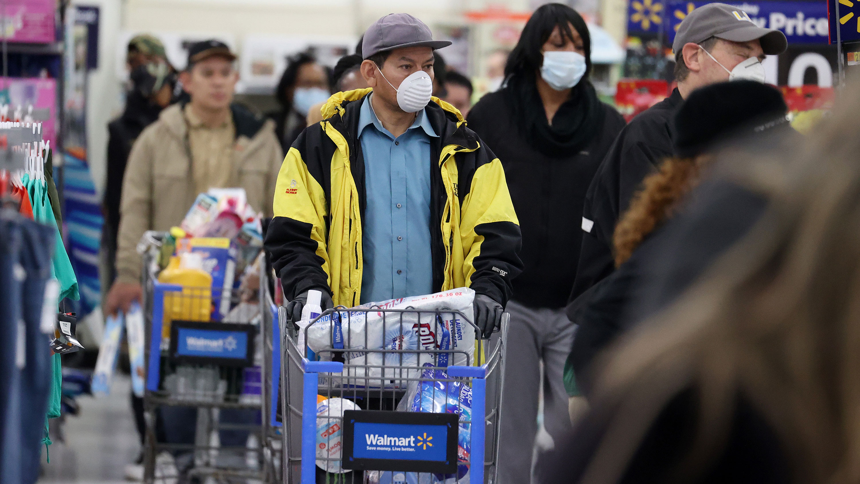 Walmart limits the number of customers in stores to help fight the spread of coronavirus