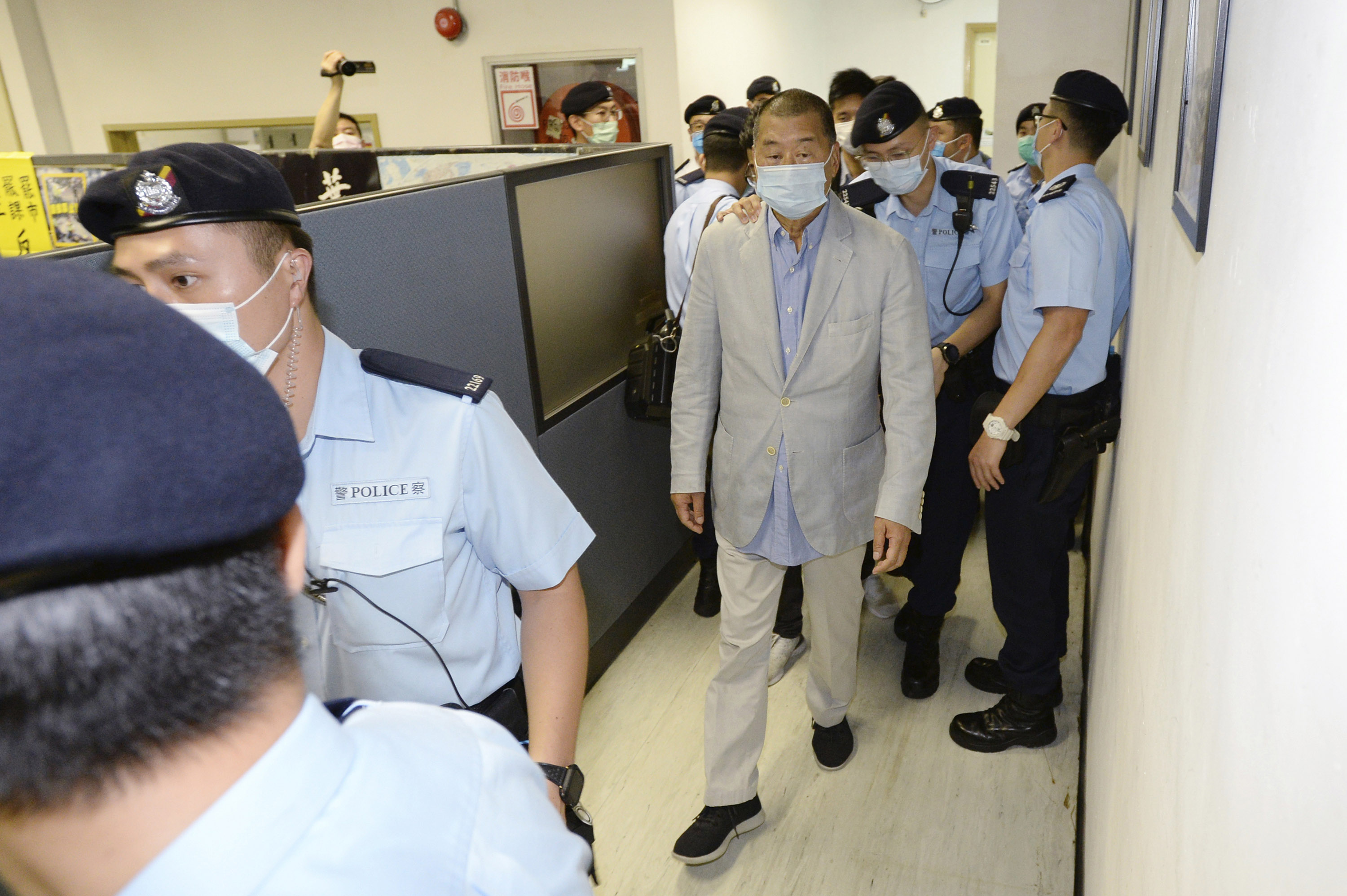 Apple Daily prints half a million copies in defiance of founder Jimmy Lai's arrest in Hong Kong
