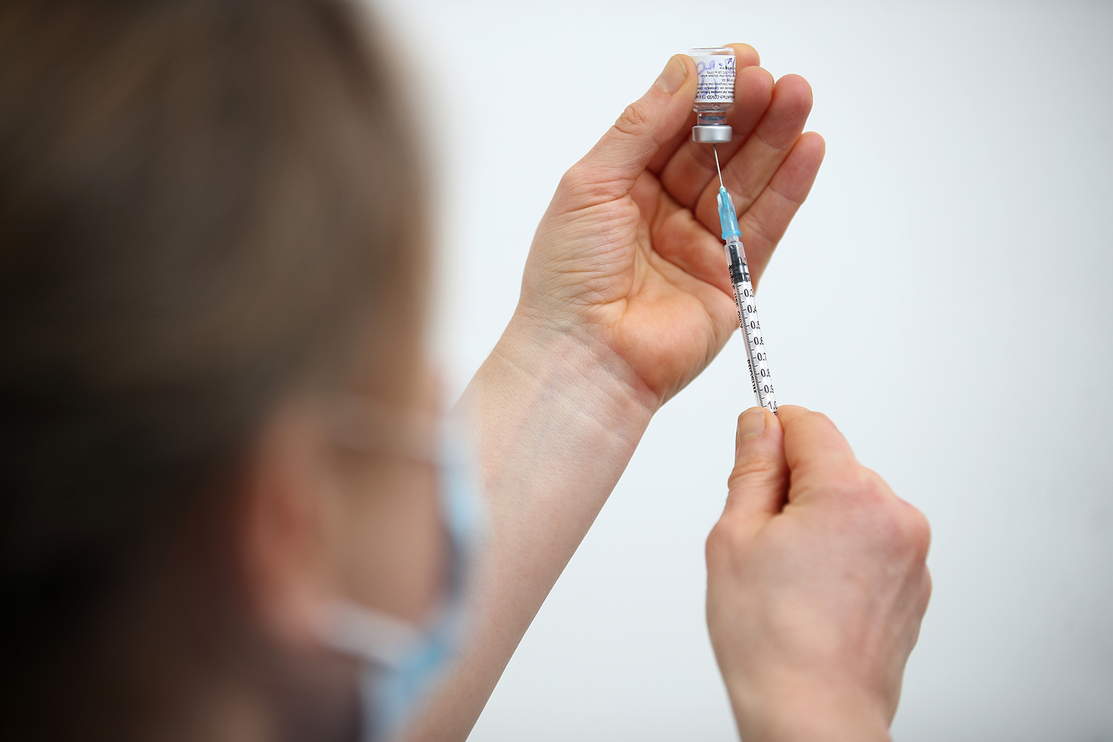 Insist or incentivize? Companies are deciding whether to make vaccines mandatory