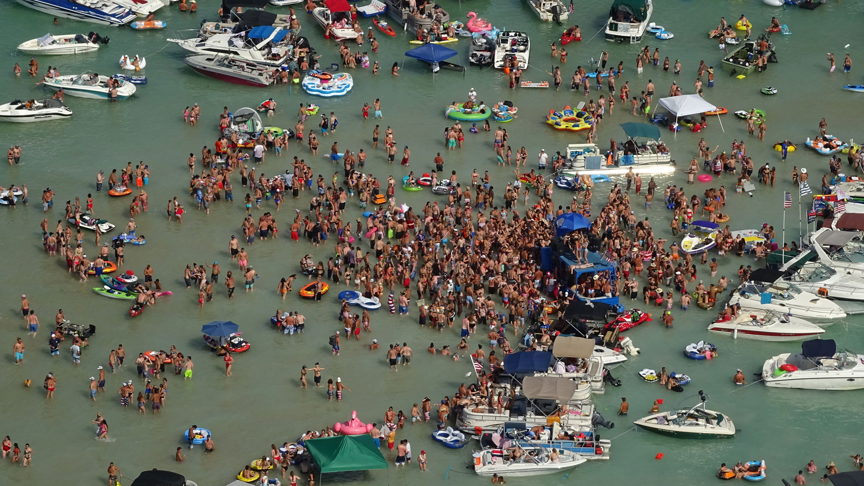 Hundreds of people celebrated the July 4 weekend at a Michigan lake. Now some have Covid-19