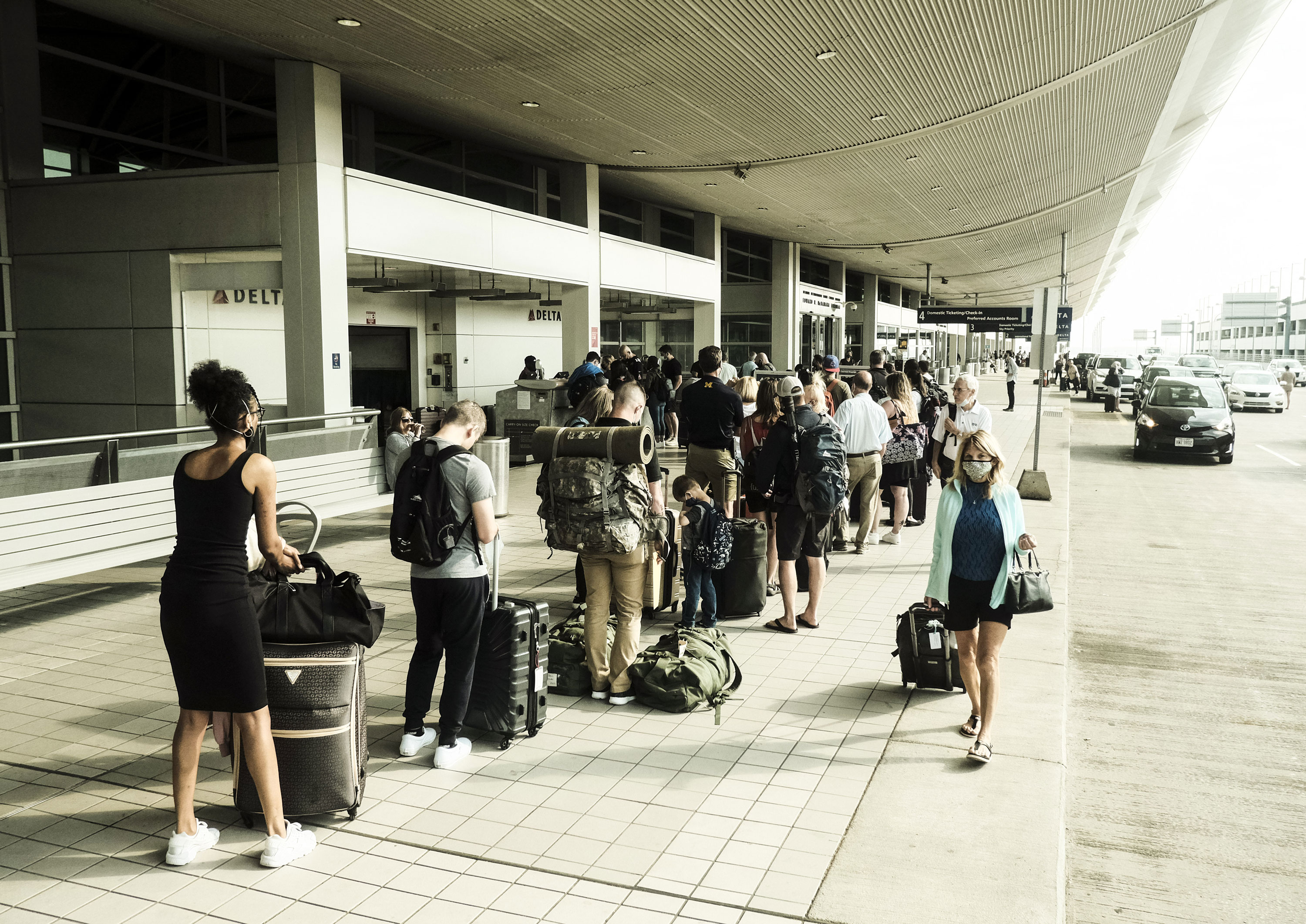 Have suitcase, will travel! Americans take to the skies in almost pre-pandemic numbers as Covid-19 restrictions ease