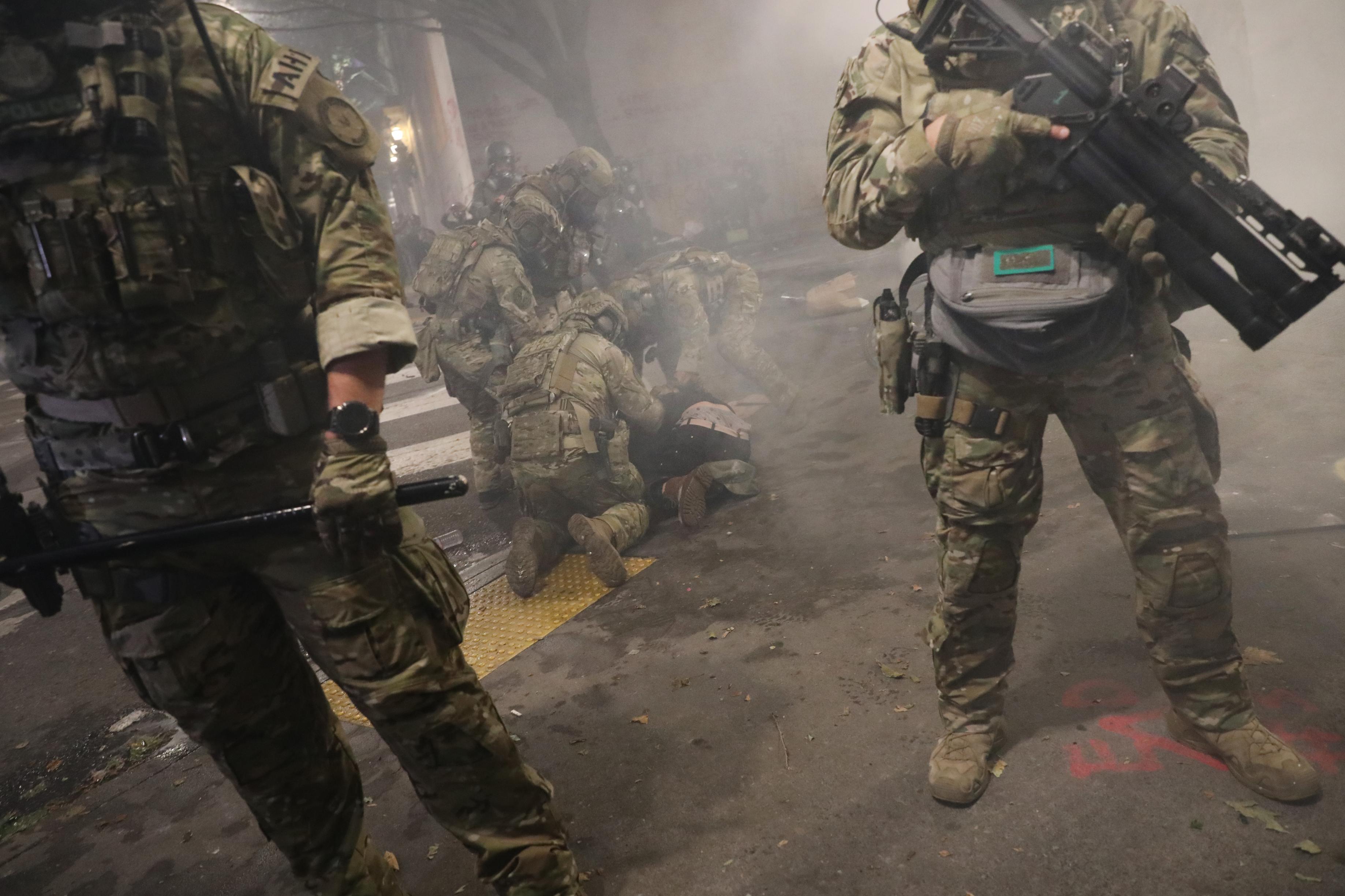 DHS to replace military-style uniforms for federal police officers