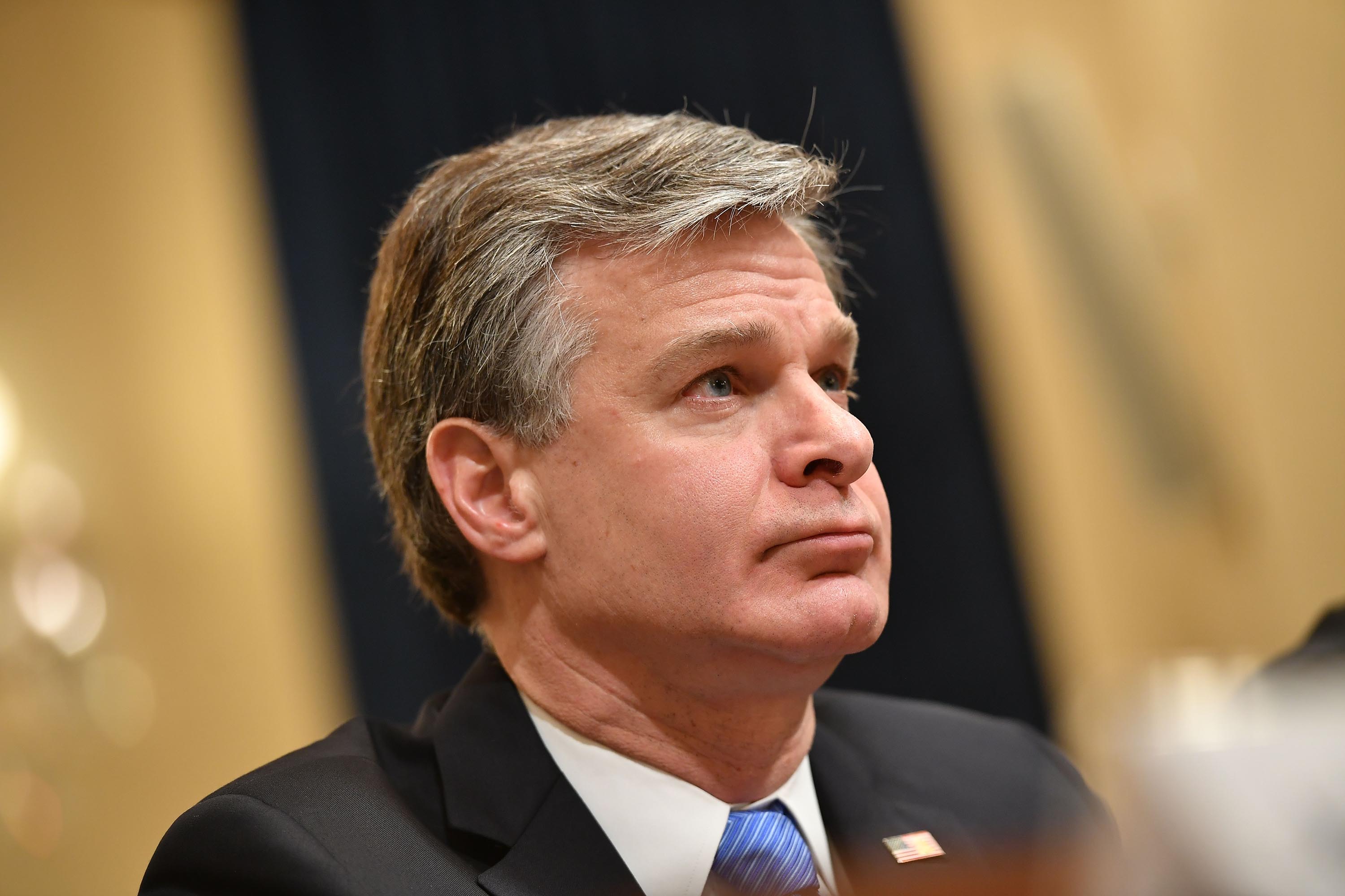 FBI director Wray says Russia is actively interfering in 2020 election to 'denigrate' Biden