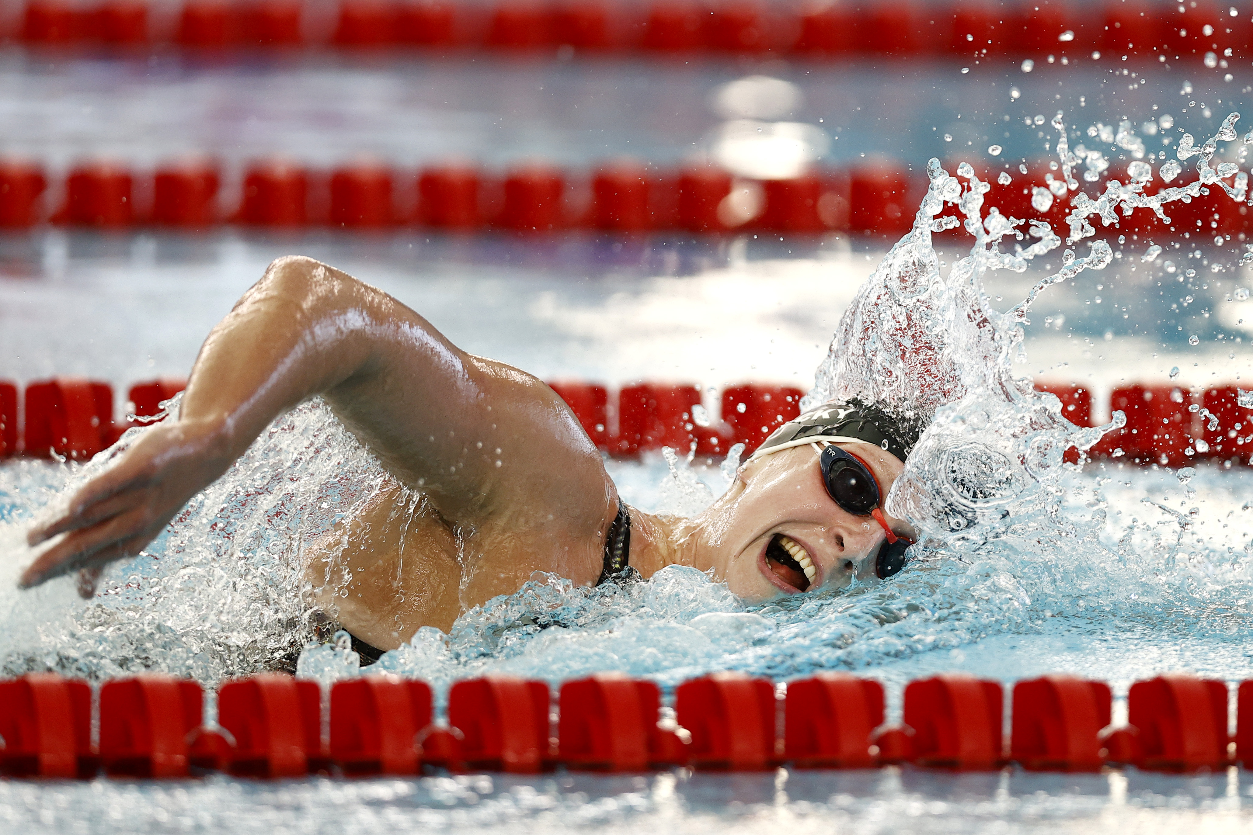 Katie Ledecky wins by 21 seconds in her first race for a year