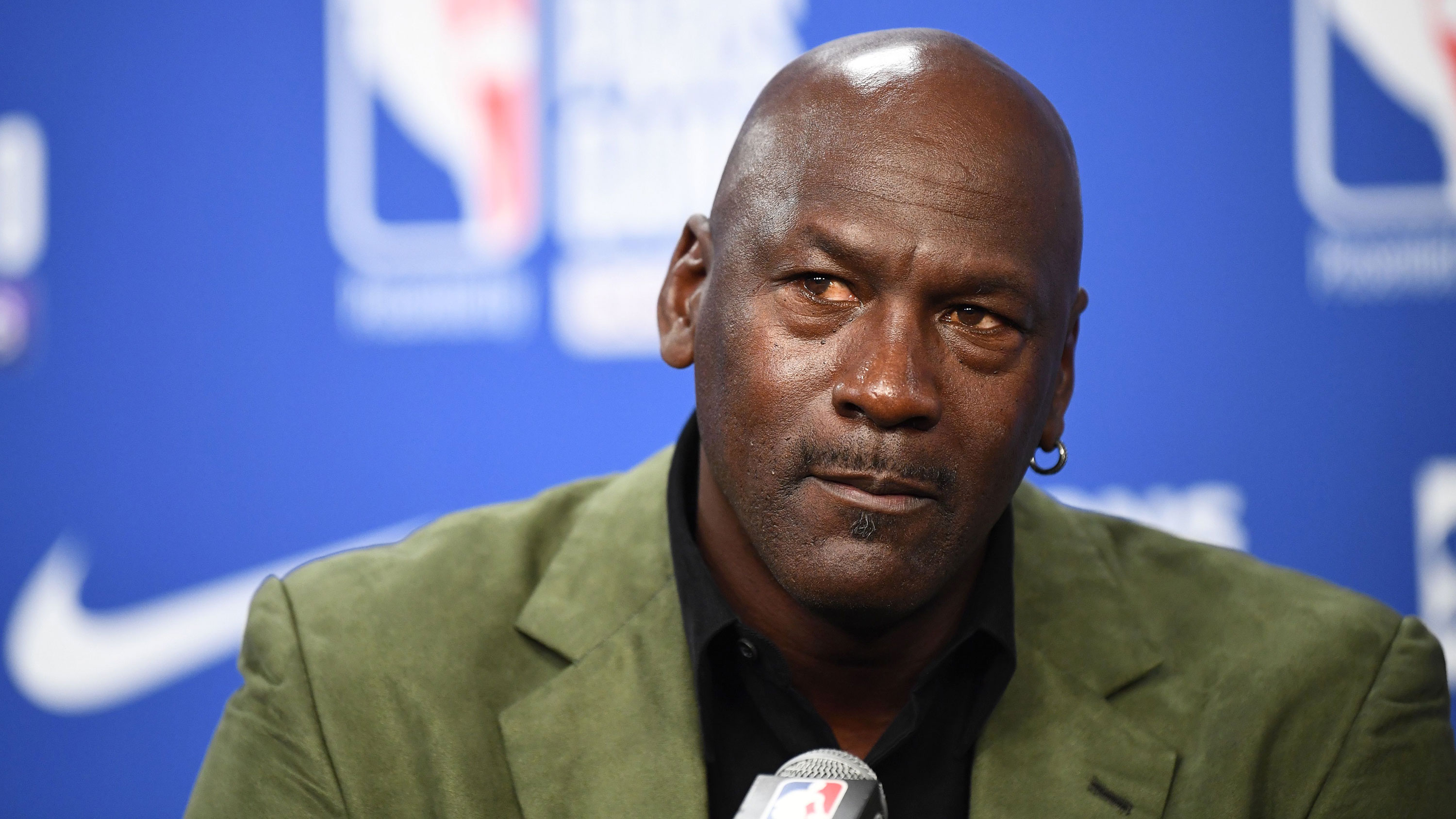 Michael Jordan says he is ‘deeply saddened, truly pained and plain angry’ about George Floyd’s death