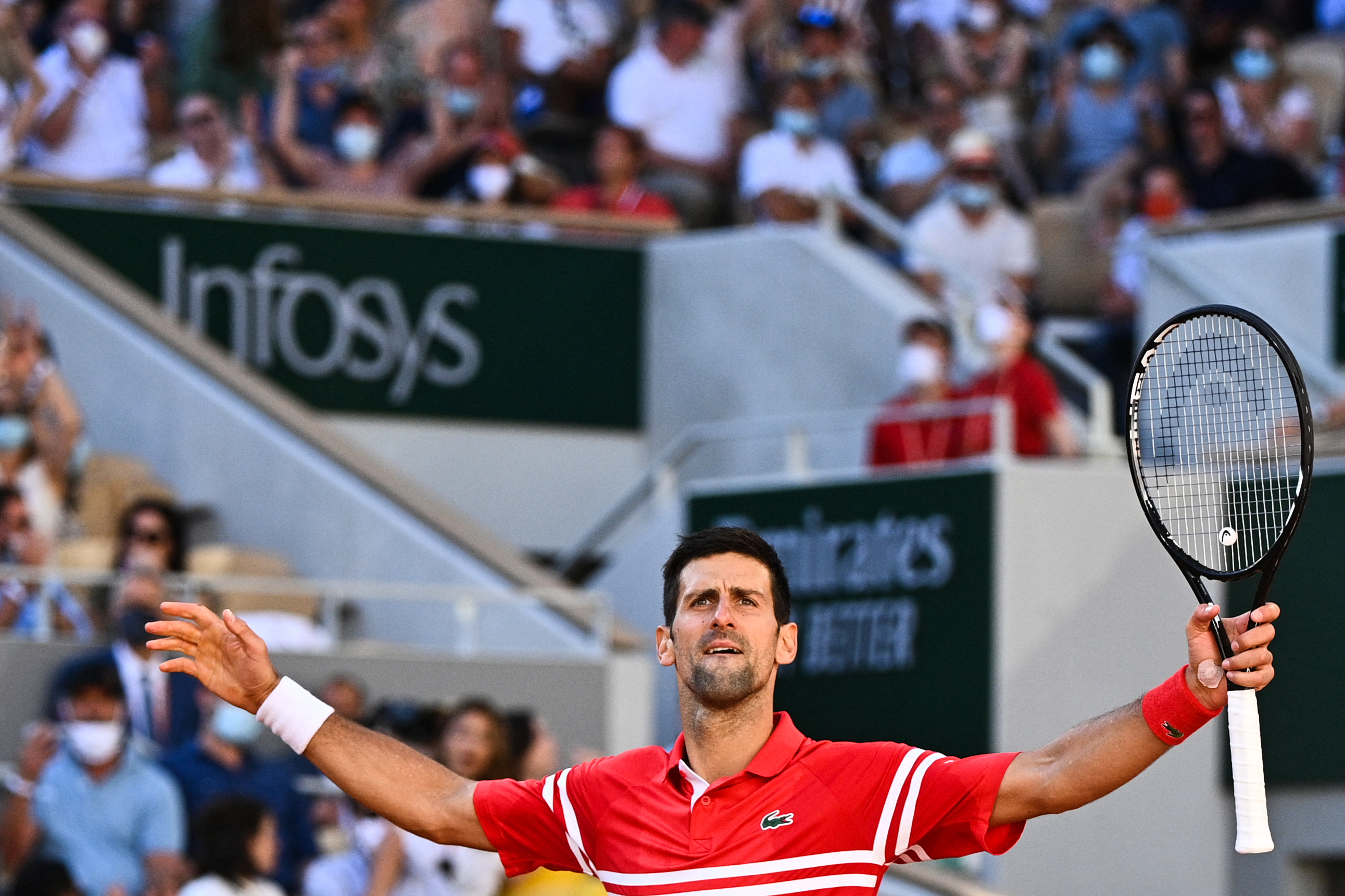 Novak Djokovic comes from two sets down to beat Stefanos Tsitsipas in thrilling French Open final