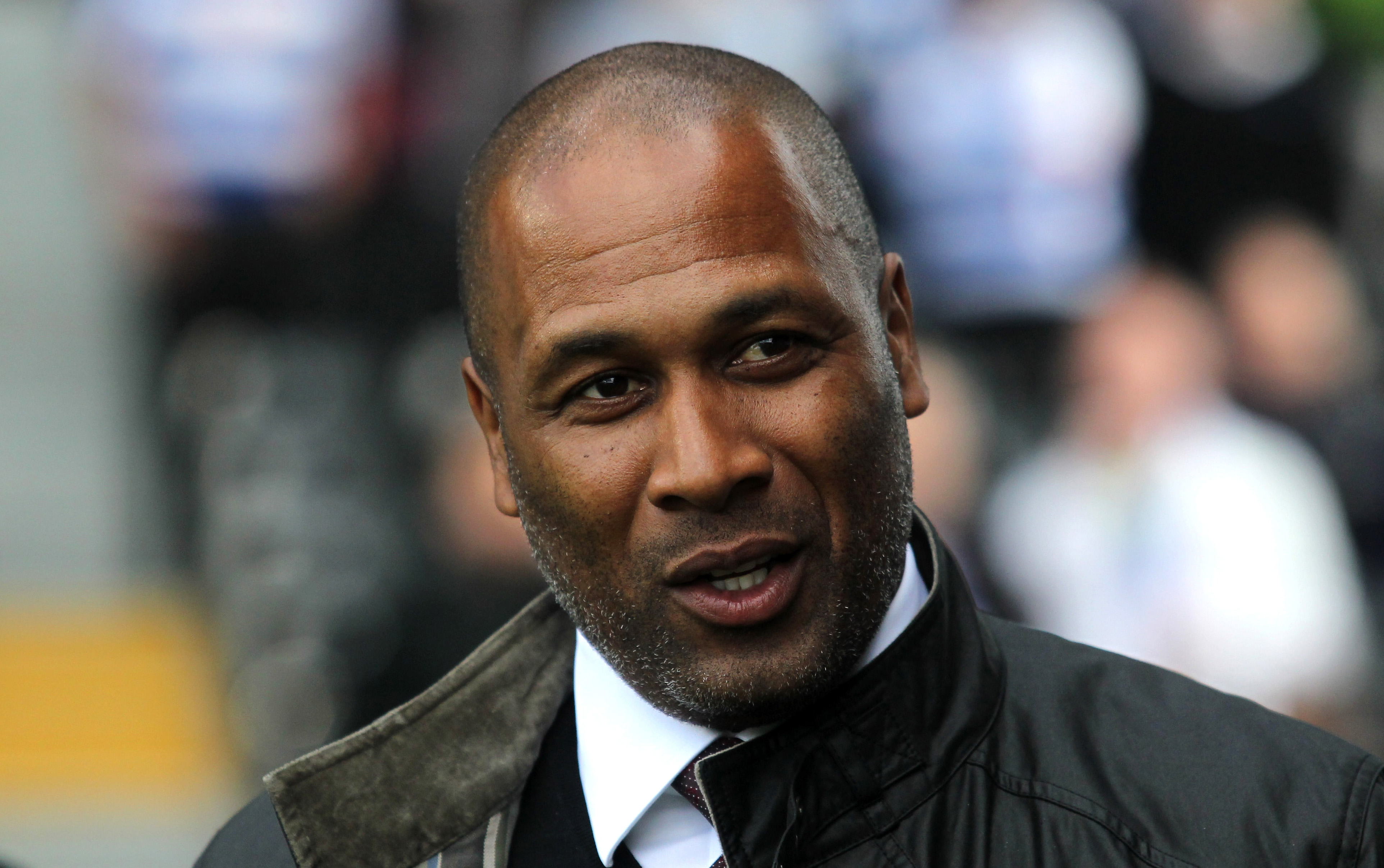 QPR director Les Ferdinand criticizes football's obsession with gestures over 'actions' when it comes to racism
