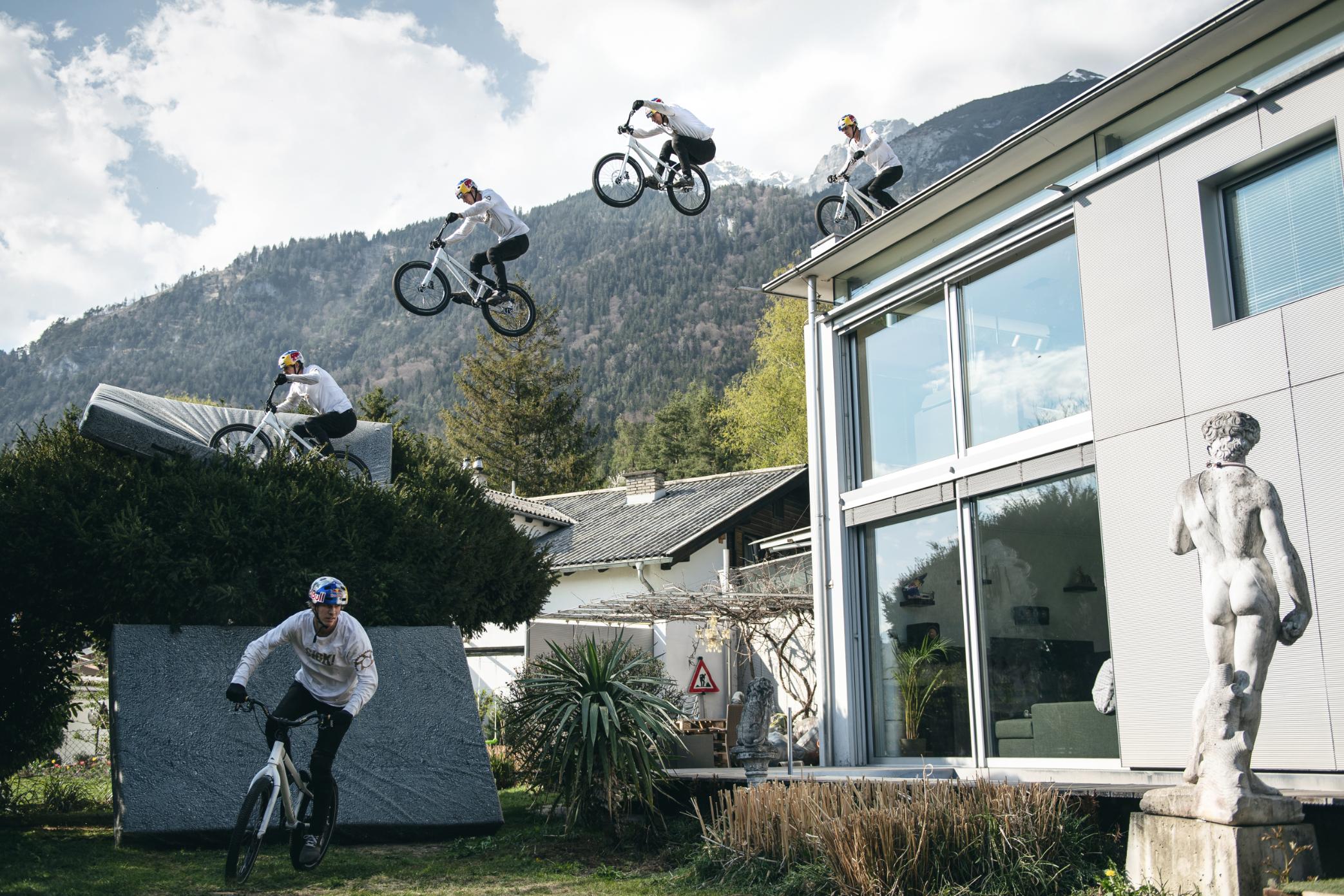 Daredevil biker Fabio Wibmer swaps mountains for washing machine stunts