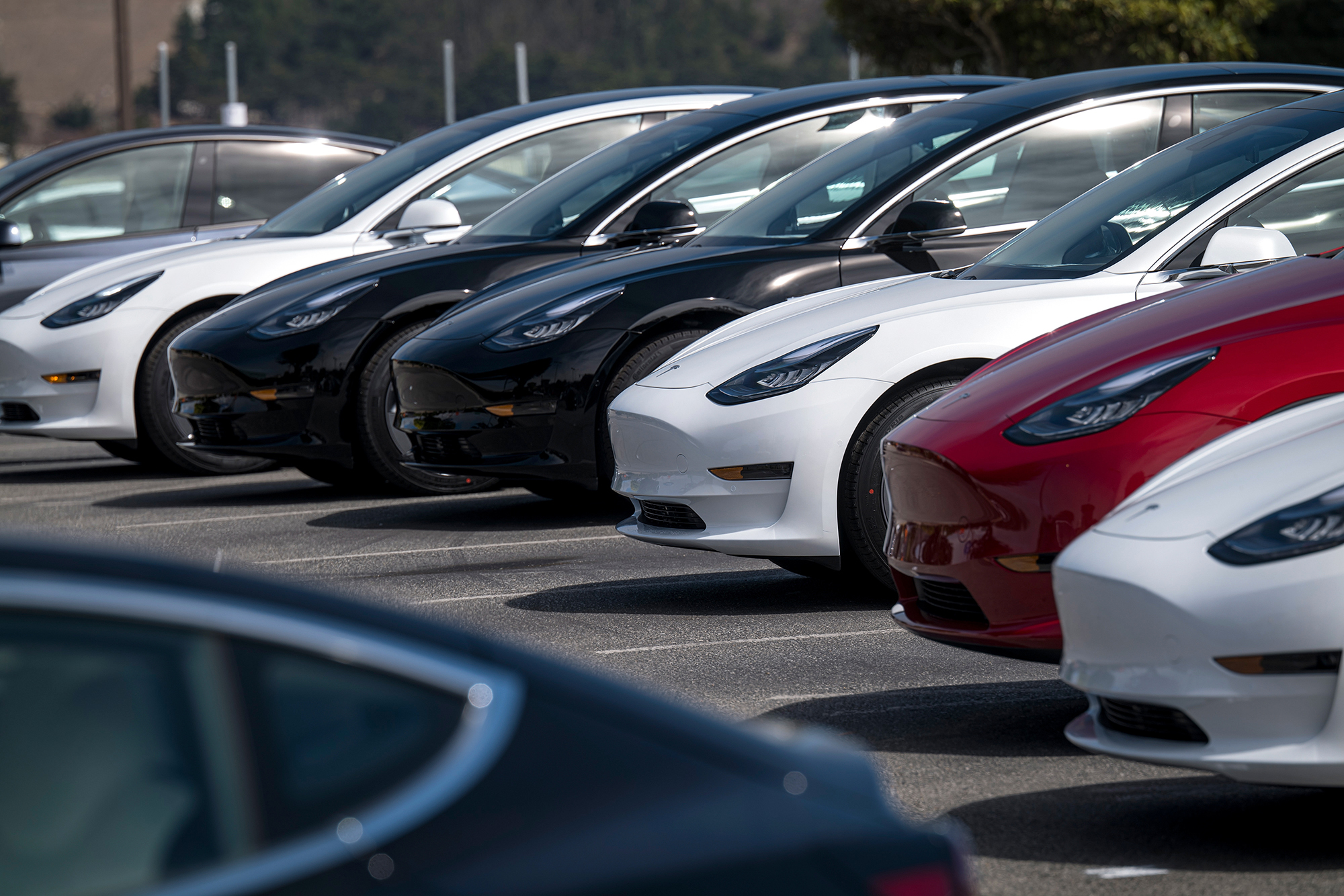 Tesla stock climbs after hours after company posts record profit and says it will sell half a million cars this year