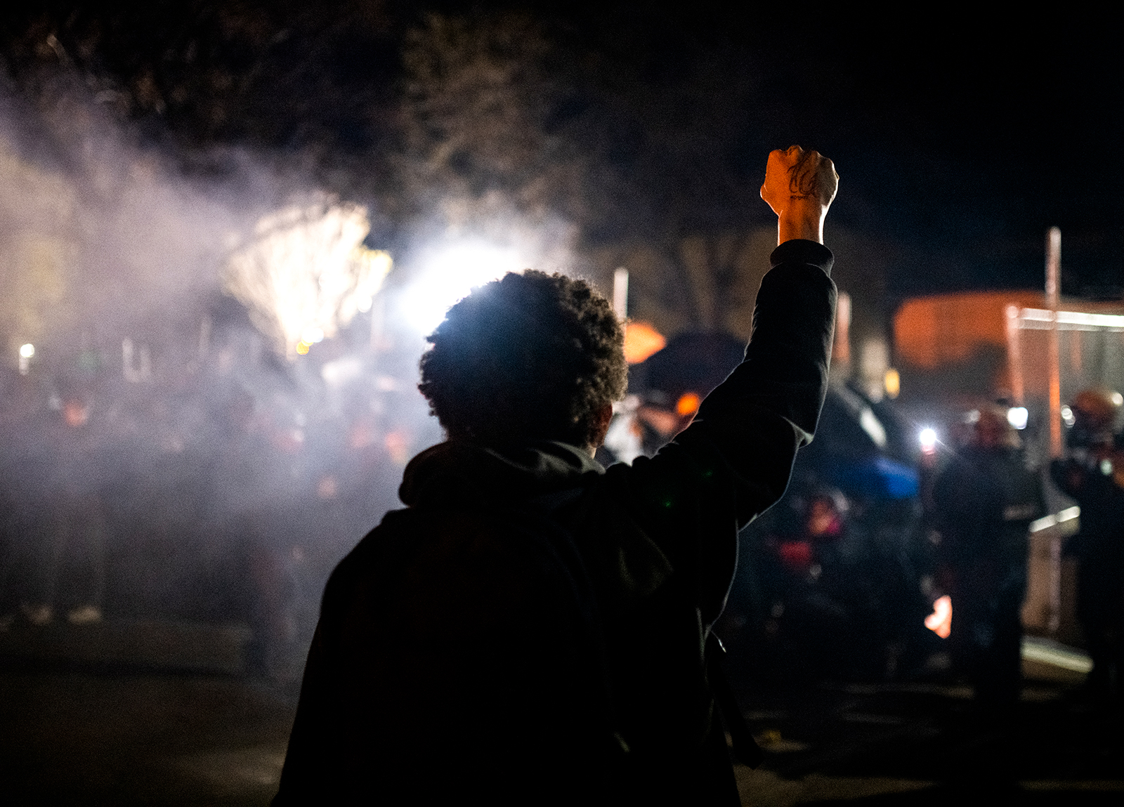 At least 100 people arrested on tense sixth night of protests as Daunte Wright's loved ones mourn for his son