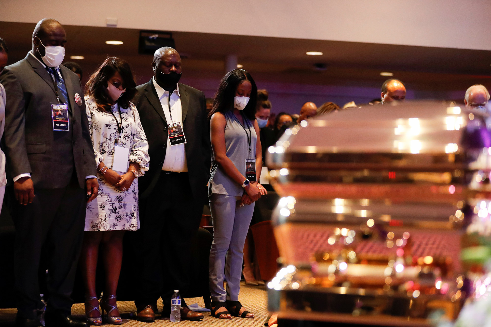 George Floyd remembered at memorial for changing the world as bail is set for ex-officers charged in his death