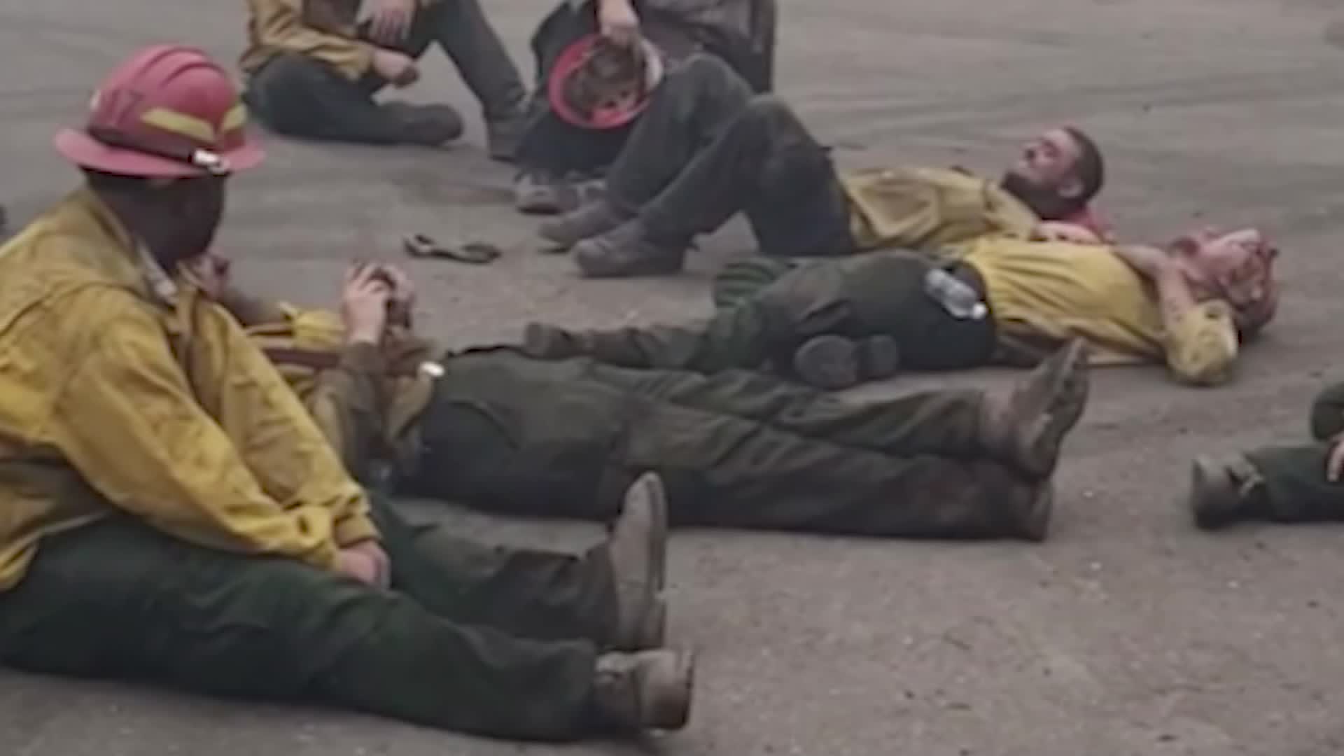 Exhausted firefighters sing together after a 14-hour shift battling wildfires in Oregon