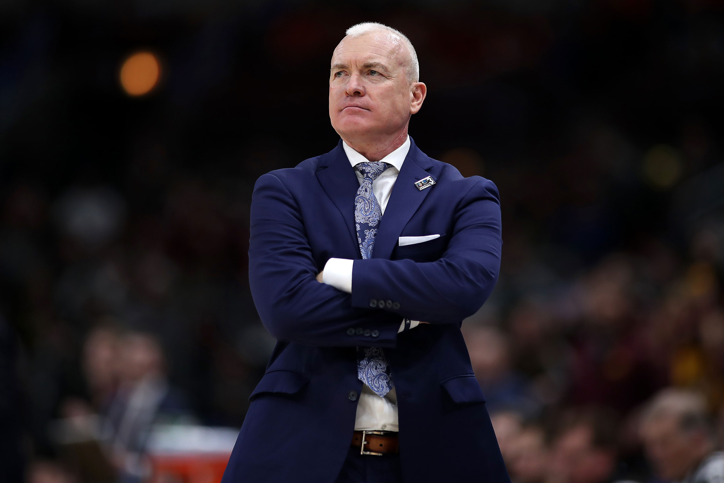 A remark about a noose around a player's neck led to Penn State basketball coach's resignation
