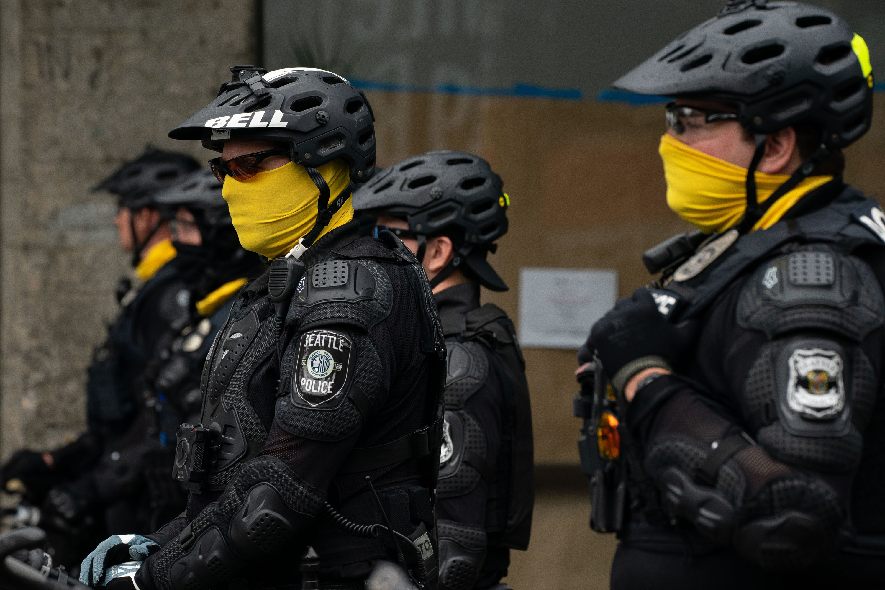 Seattle's mayor is set to sign a new city budget cutting the police department's funding by 18%