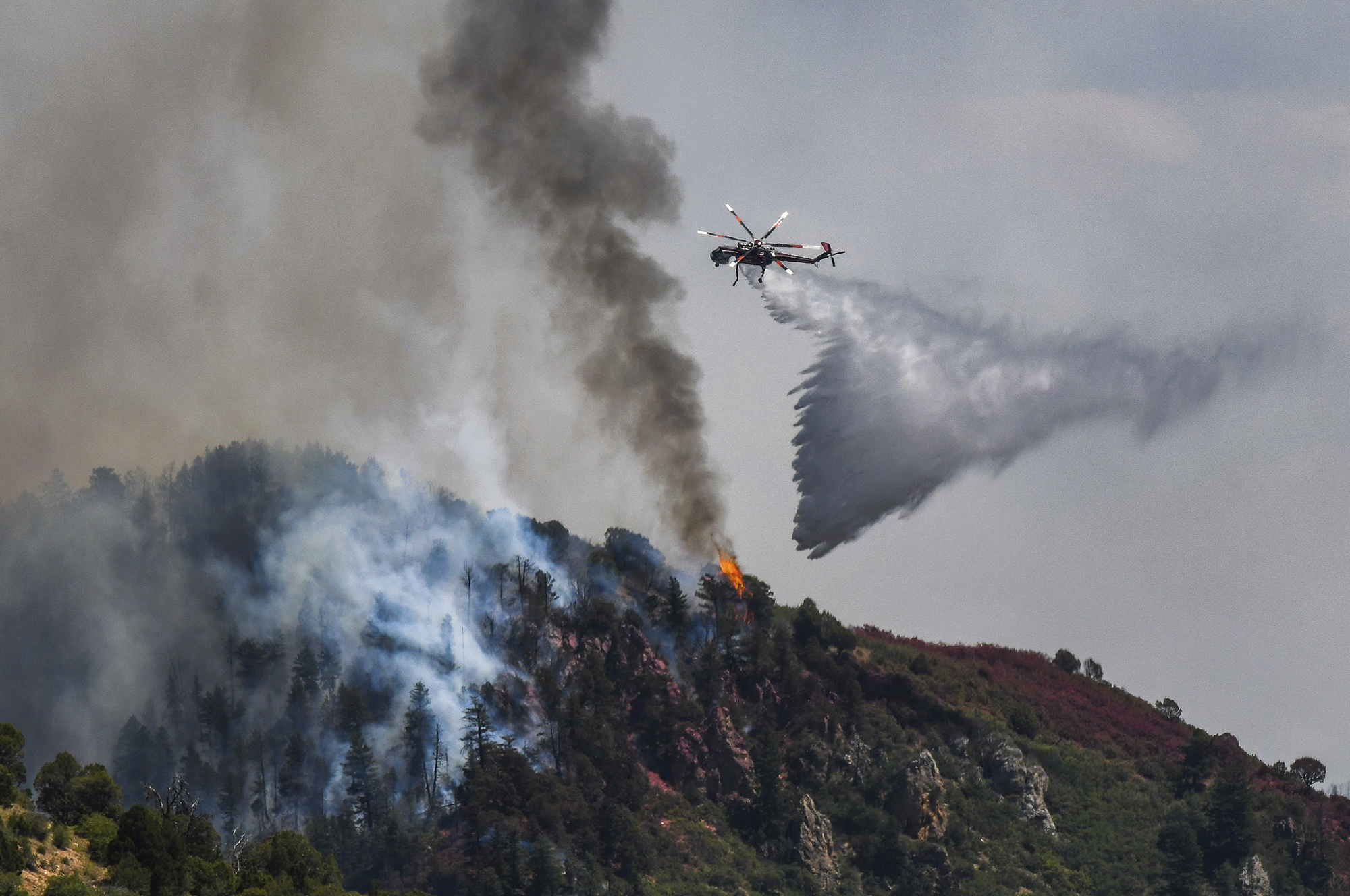 Wildfires have destroyed more than 73,000 acres across 3 states and are spreading fast
