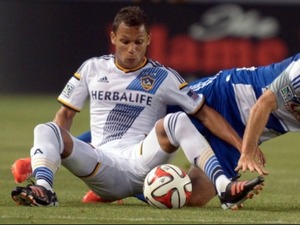 Kenney W. action photo