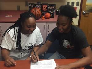 Tinekqua C. action photo