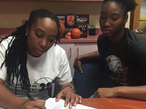 Tinekqua C. action photo