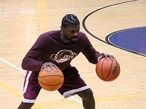 Coach B G. action photo