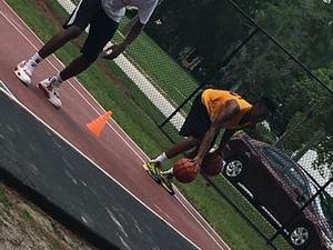 Tinekqua C. action photo