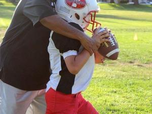 Raymond R. action photo