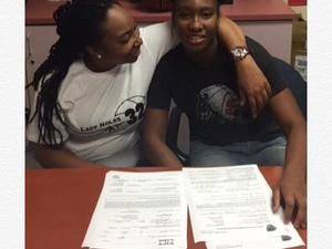 Tinekqua C. action photo