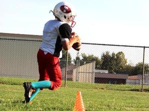 Raymond R. action photo