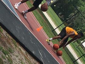 Tinekqua C. action photo