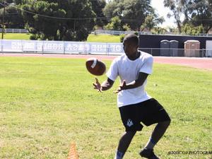 Raymond R. action photo