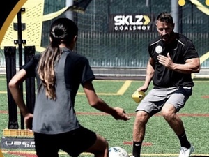 Adam W. action photo