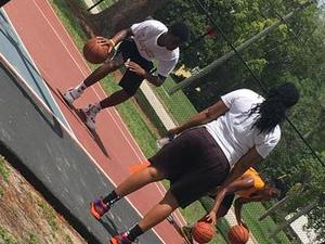 Tinekqua C. action photo