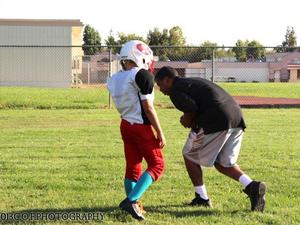 Raymond R. action photo