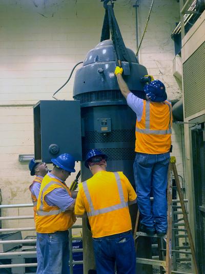 Workers working on Lift Station Pump