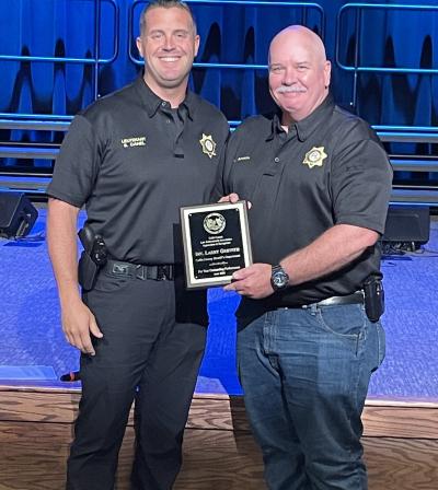 picture of award being presented to deputy