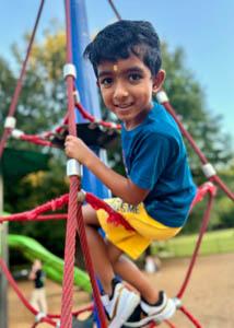photo of a young boy on the playground